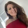 Sara Lowndes, a holistic sleep coach, smiling.
